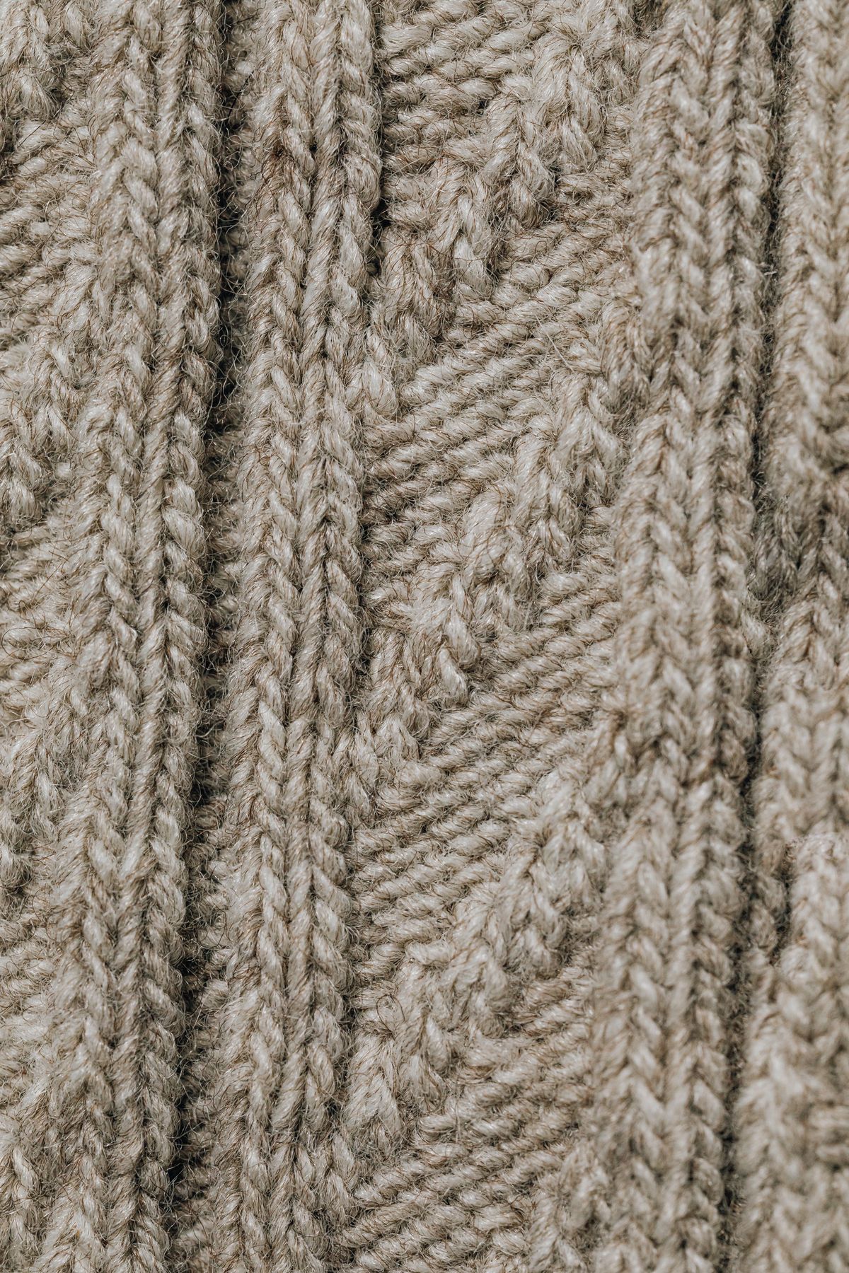 Close-up of a soft knitted textile and its stitch pattern